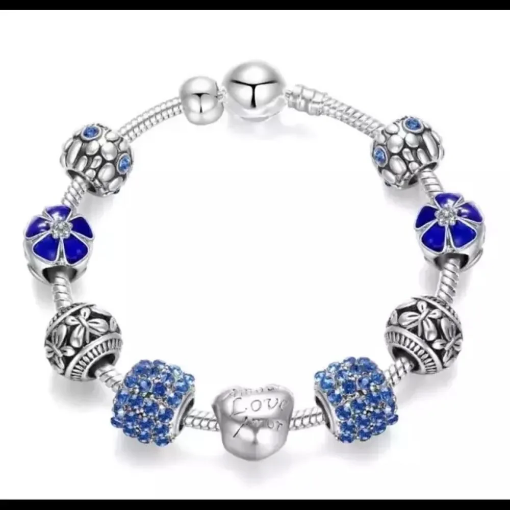TRENDY BLUE 9 PIECE CHARM BRACELET - Picture 1 of 3